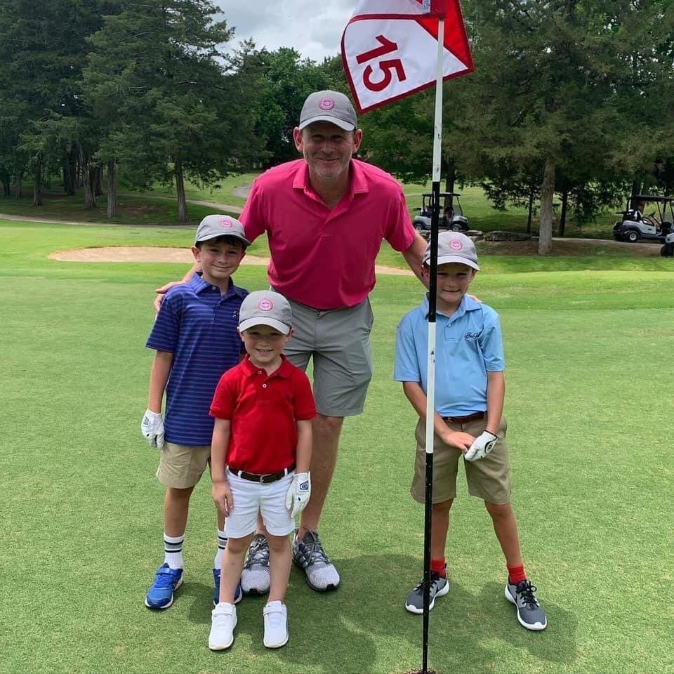 Brandt Snedeker with his son (left), Jack (center), and another competitor.